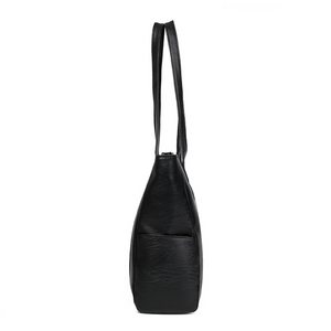 Side view of large black tote bag