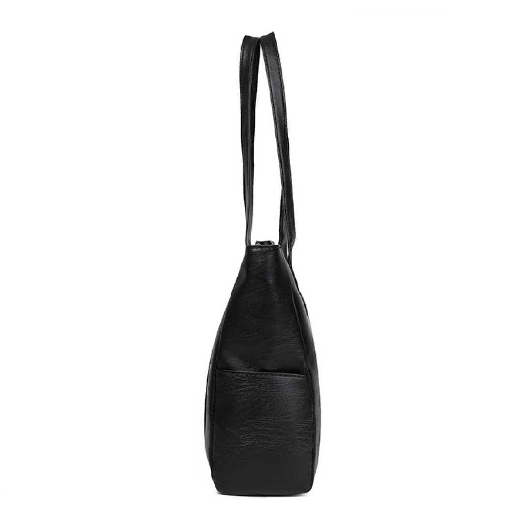 Side view of large black tote bag