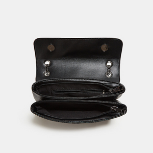 Top view of black quilted chain shoulder bag
