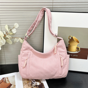 Pink corduroy shoulder bag for casual use
